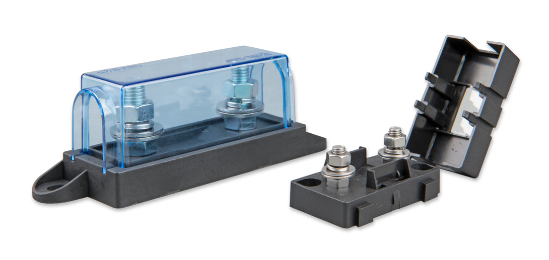 Electrical fuse block with clear cover on a white background