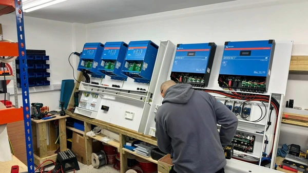 Callidus engineers building and testing pre-built off-grid boards